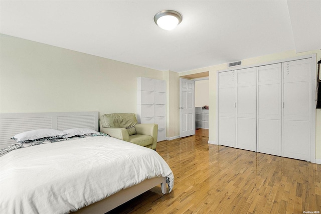 bedroom featuring light hardwood / wood-style floors