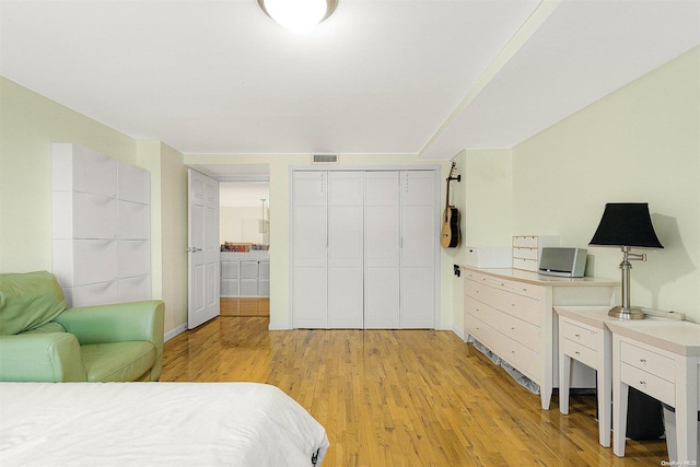 bedroom with light hardwood / wood-style floors