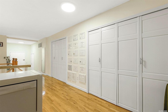 kitchen with light hardwood / wood-style flooring