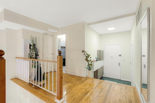 foyer with hardwood / wood-style flooring