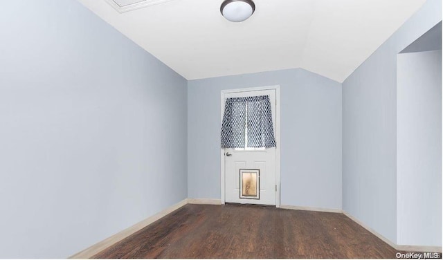 bonus room featuring dark hardwood / wood-style floors and lofted ceiling