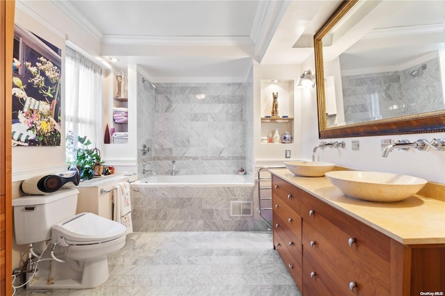 bathroom with vanity, crown molding, a relaxing tiled tub, and toilet