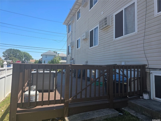 deck with a wall unit AC