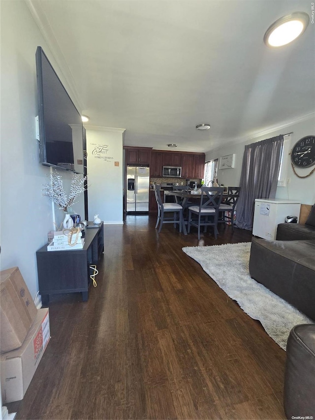 living room with dark hardwood / wood-style floors