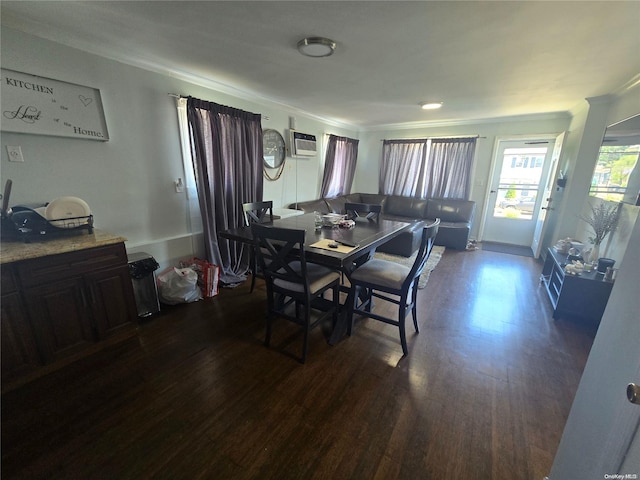 dining space with dark hardwood / wood-style flooring, crown molding, and a wall mounted AC