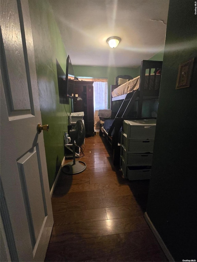 bedroom featuring hardwood / wood-style flooring