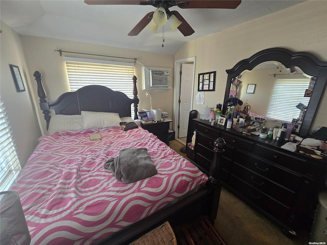 bedroom with an AC wall unit and ceiling fan