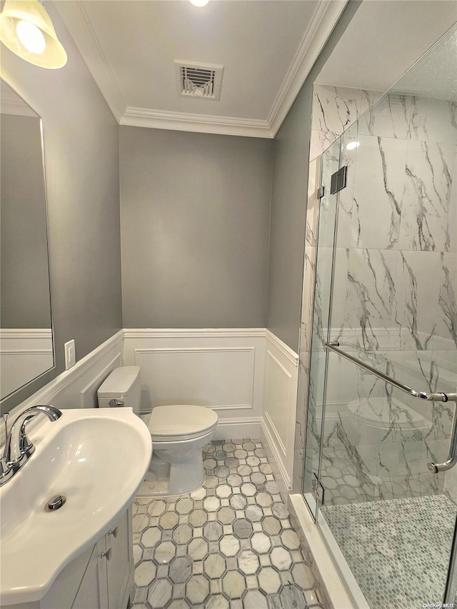 bathroom with walk in shower and ornamental molding