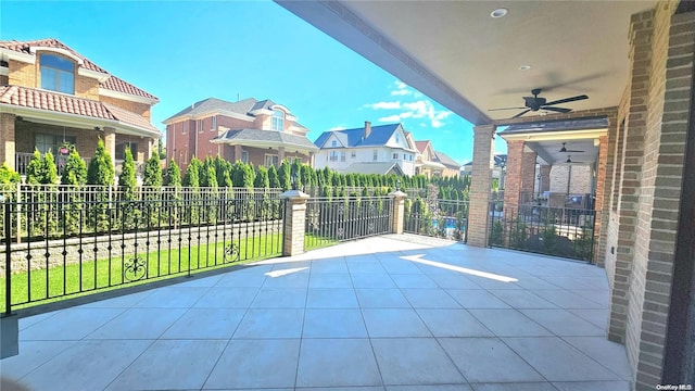 view of patio / terrace featuring ceiling fan