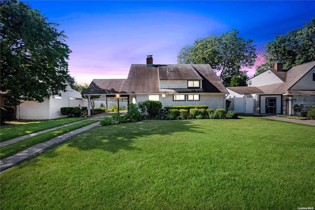 15 Bobwhite Ln, Hicksville, NY 11801 - view of front of home featuring a yard