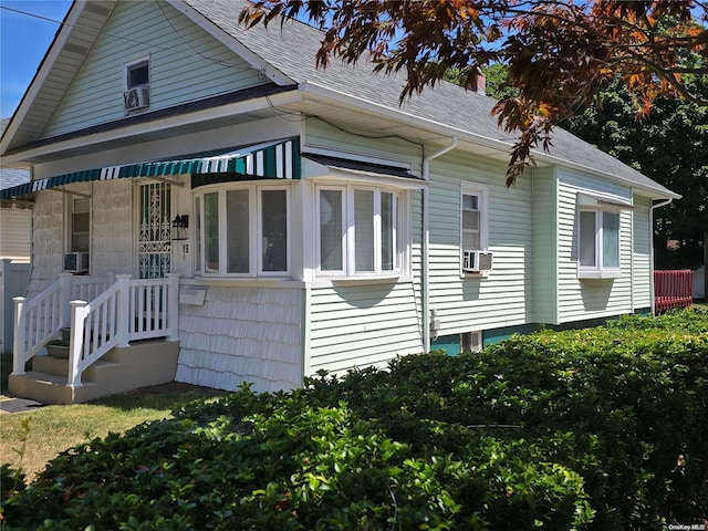 view of home's exterior featuring cooling unit