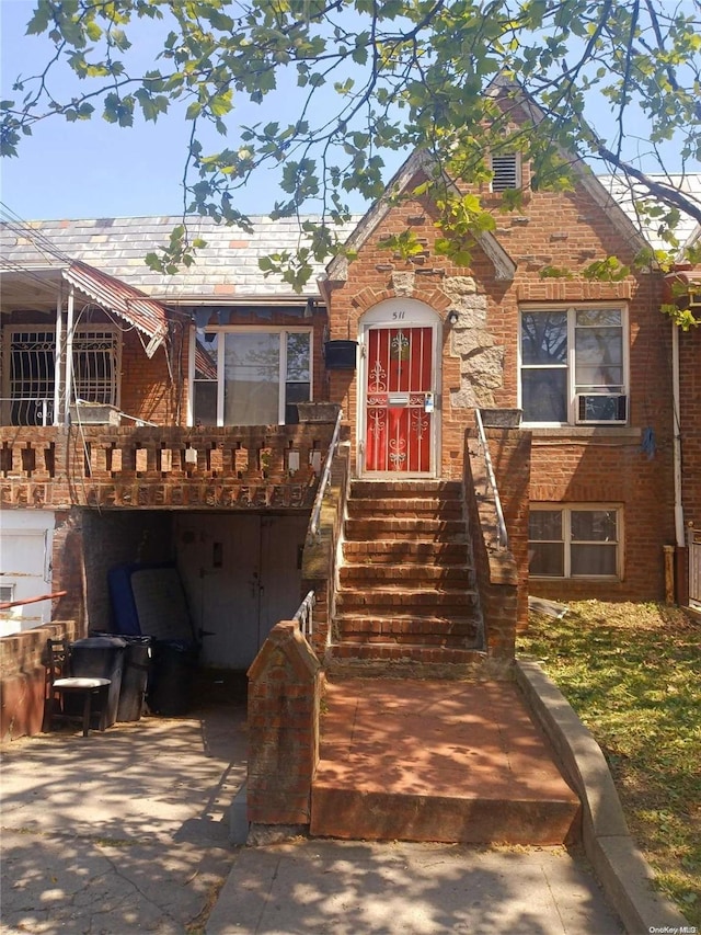 view of front of house featuring cooling unit