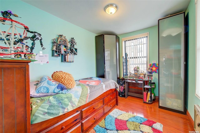 bedroom featuring light wood-type flooring