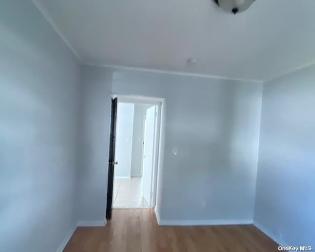 spare room featuring light wood-type flooring