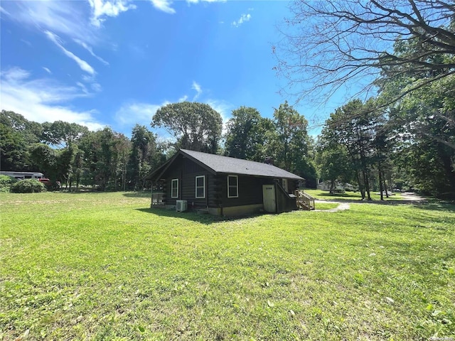 view of property exterior featuring a yard