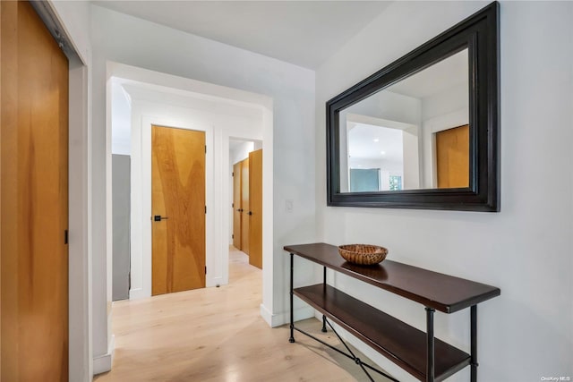 hall featuring light wood-type flooring