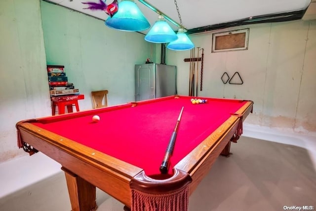 recreation room with concrete floors and billiards