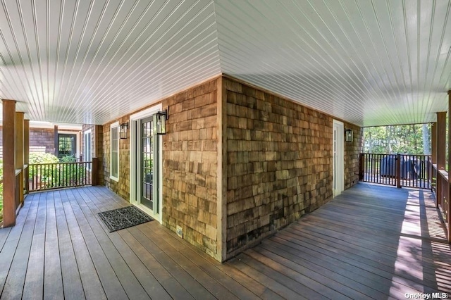 wooden terrace with covered porch