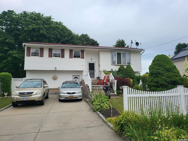 split foyer home featuring a garage