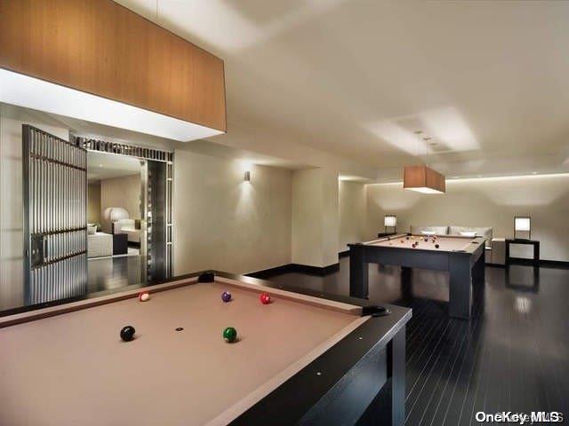 recreation room featuring wood-type flooring and pool table