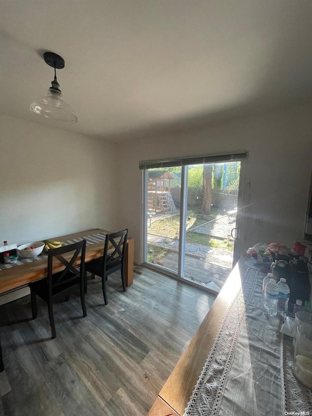 dining area featuring wood-type flooring