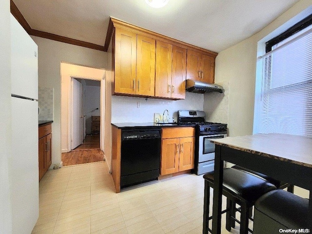 kitchen with gas range, black dishwasher, light hardwood / wood-style flooring, range hood, and crown molding