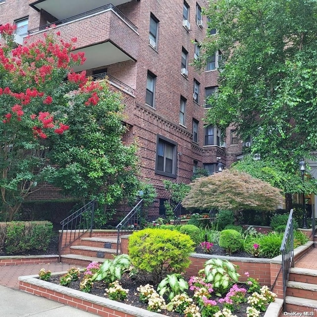 view of property with stairway