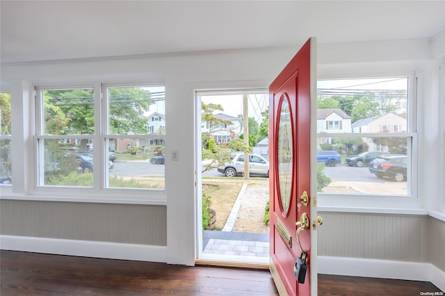 entryway with dark hardwood / wood-style floors