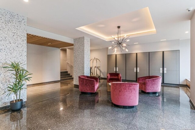 17-85 215th St Unit 6R, Bayside, NY 11360 - building lobby featuring stairs and a security system