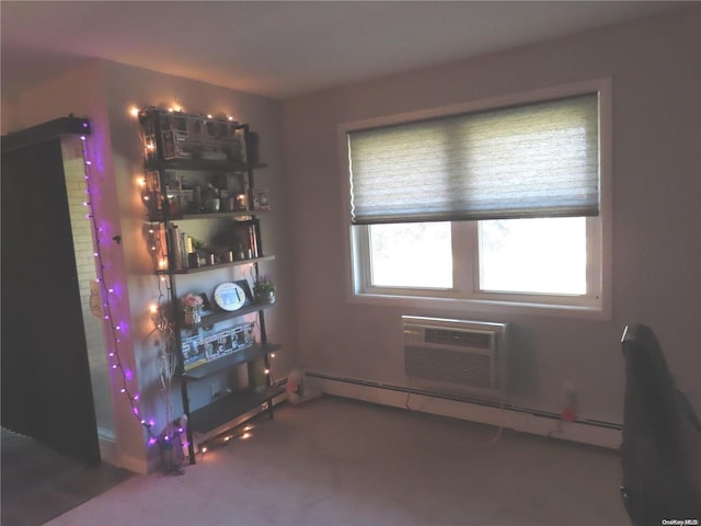 interior space featuring an AC wall unit, dark carpet, and a baseboard heating unit