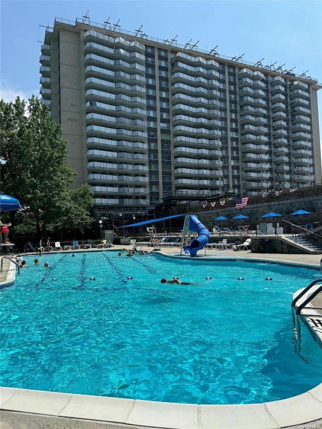 17-85 215th St Unit 4J, Bayside, NY 11360 - community pool featuring a water slide
