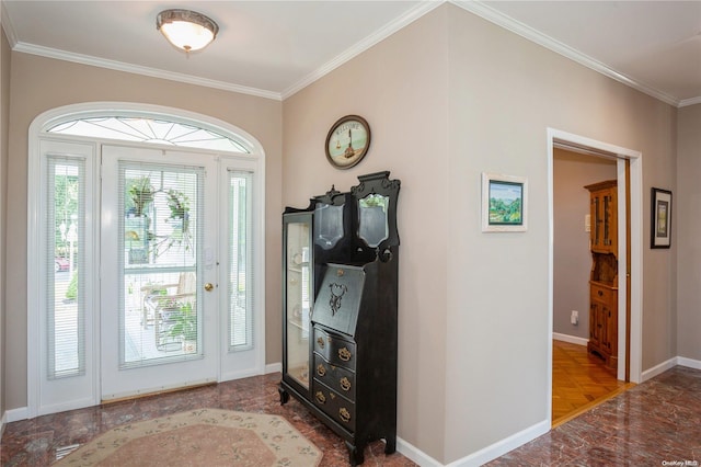 entrance foyer with parquet flooring and crown molding