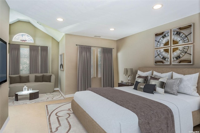 carpeted bedroom featuring vaulted ceiling