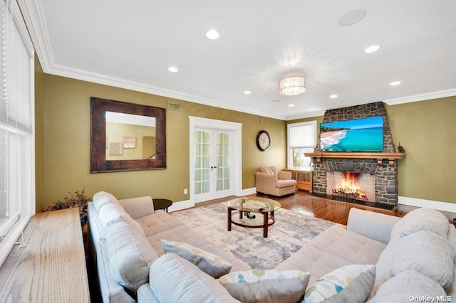 262 Howard Ave, Staten Island, NY 10301 - living area featuring ornamental molding, recessed lighting, baseboards, wood finished floors, and a fireplace