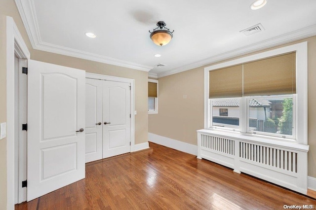 262 Howard Ave, Staten Island, NY 10301 - interior space with crown molding, a closet, wood finished floors, baseboards, and recessed lighting