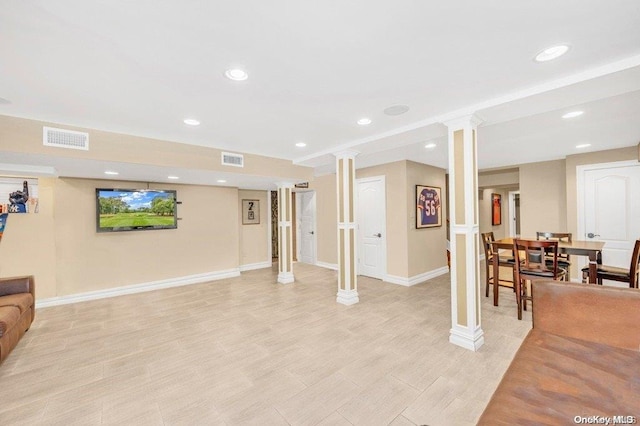 262 Howard Ave, Staten Island, NY 10301 - living room with ornate columns, baseboards, and recessed lighting