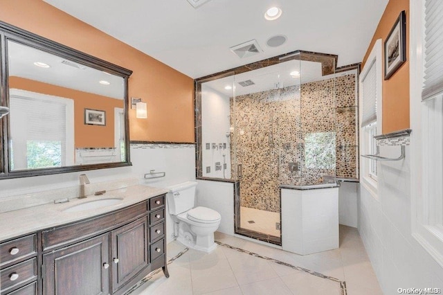262 Howard Ave, Staten Island, NY 10301 - full bathroom featuring vanity, a shower stall, toilet, tile patterned floors, and recessed lighting