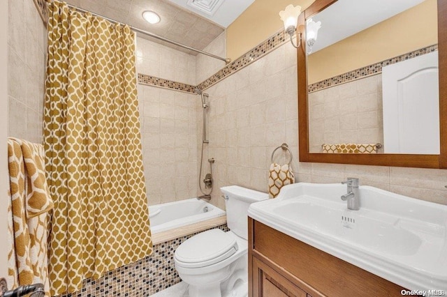 262 Howard Ave, Staten Island, NY 10301 - bathroom with tile walls, tiled shower / bath, toilet, vanity, and recessed lighting