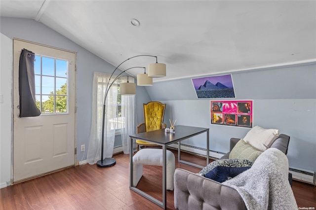 interior space with hardwood / wood-style flooring, lofted ceiling, and a baseboard radiator