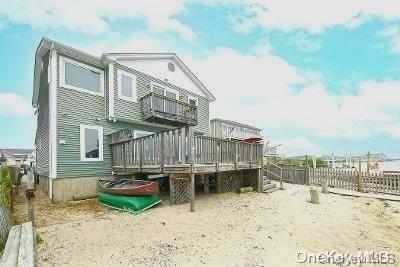 190 Bayview Ave, Lindenhurst, NY 11757 - rear view of property featuring a deck and a balcony