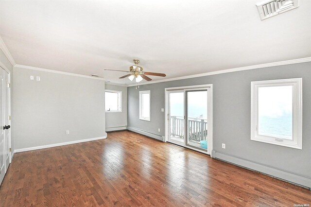 190 Bayview Ave, Lindenhurst, NY 11757 - empty room featuring crown molding, ceiling fan, wood finished floors, a baseboard heating unit, and baseboards