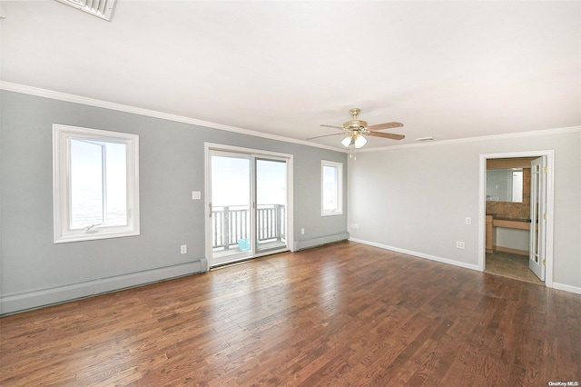 190 Bayview Ave, Lindenhurst, NY 11757 - spare room featuring ornamental molding, a ceiling fan, baseboards, wood finished floors, and baseboard heating