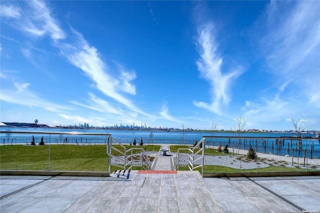 view of patio / terrace with a water view