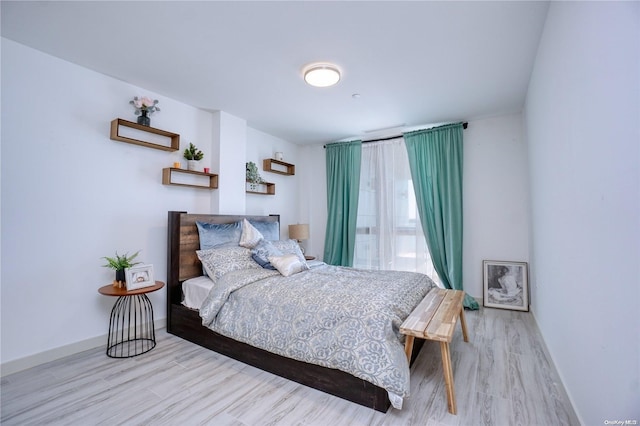 bedroom featuring light hardwood / wood-style flooring