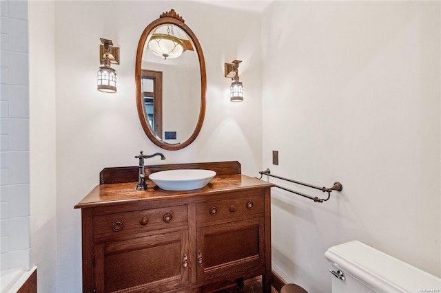 bathroom with vanity and toilet