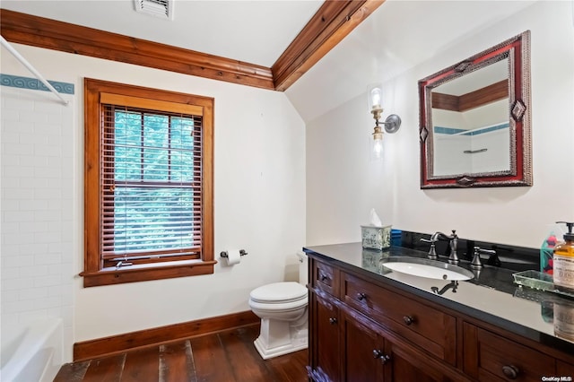 full bathroom featuring hardwood / wood-style floors, vanity, toilet, and bathing tub / shower combination