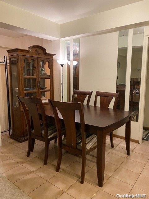 view of tiled dining space