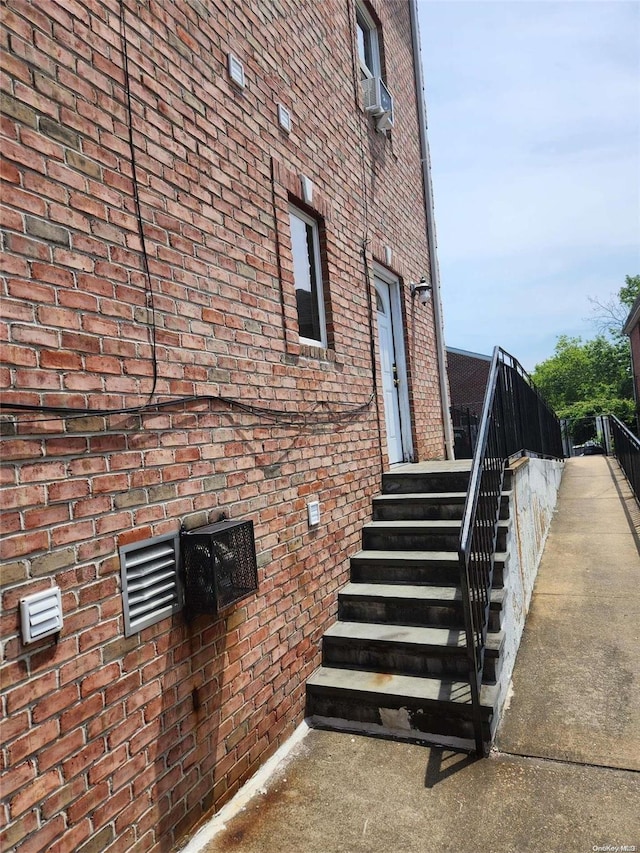 view of side of home with cooling unit