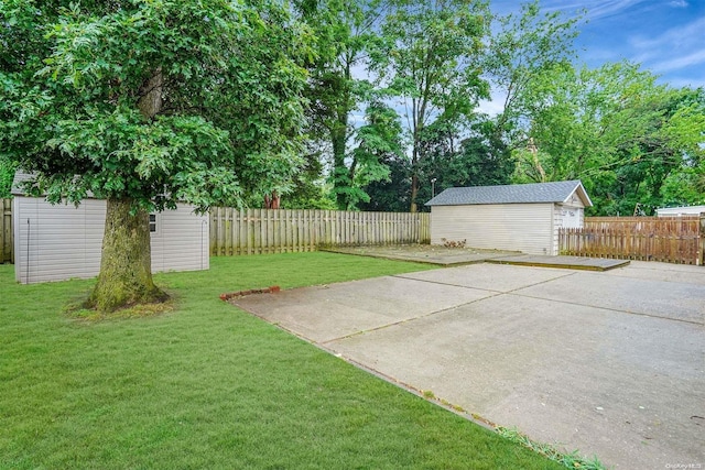 view of yard with a patio and an outdoor structure