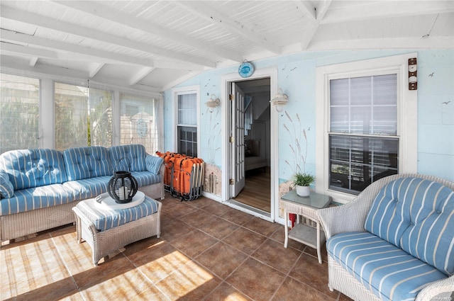 sunroom / solarium with lofted ceiling with beams